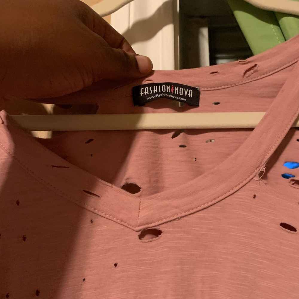 Pink long sleeve tie front shirt with holes